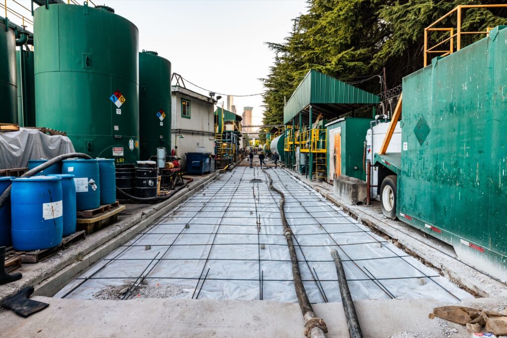 Rebar mat tied and ready between the plant tanks